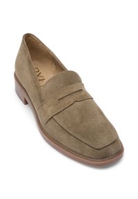 Khaki suede loafers with a flat brown sole, featuring a subtle raised accent across the vamp. Smooth texture, rounded toe, and low profile.