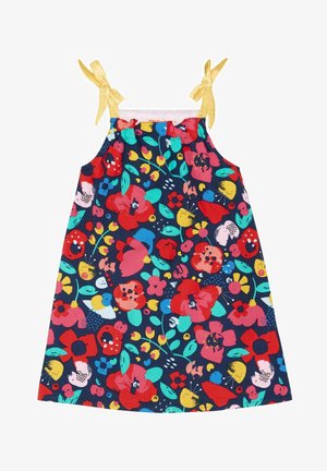 Ärmelloses Blumenkleid mit gelben Bandträgern, das einen marineblauen Hintergrund mit buntblühenden Pflanzen und Blättern ziert.