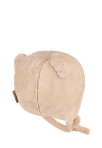 Soft beige fleece baby hat with bear ears and chin strap, designed for warmth and comfort.