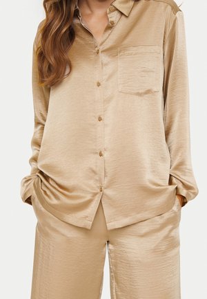 Blus - mottled light brown