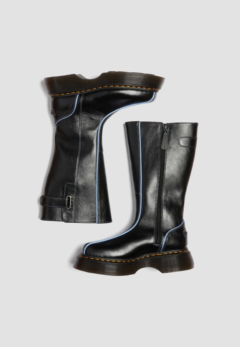 Black mid-calf leather boots with light blue trim, side zipper, thick sole, and yellow stitching on a light gray background.