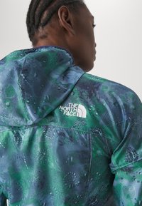 The North Face HIGHER RUN WIND JACKET - Sportska jakna - steel blue