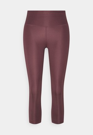 Leggings cropped a vita alta color mauve, con tessuto morbido e dettaglio della cucitura centrale dalla vita all'orlo, presentati su uno sfondo bianco.