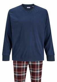 Chemise marine à manches longues avec col rond et poignets bleu foncé contrastants, assortie à un pantalon à carreaux rouge et marine avec un motif de damier.