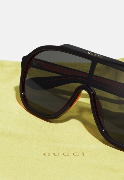 Gucci Slnečné okuliare - black/grey