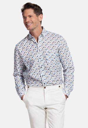 Lange mouwen overhemd met een lichtblauwe kleur en een klein, veelkleurig bloemenpatroon. Bevat een enkele borstzak en knoopmanchet.