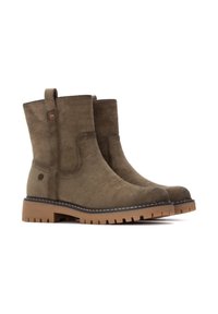 Botas de tobillo de ante verde oliva con suela de goma marrón, punta redonda, paneles elásticos laterales y lengüeta para facilitar el calzado.