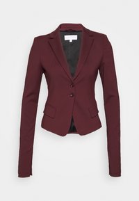 Blazer bordeaux realizzato in tessuto elasticizzato, con un design sartoriale, maniche lunghe, due tasche frontali e chiusura a due bottoni.