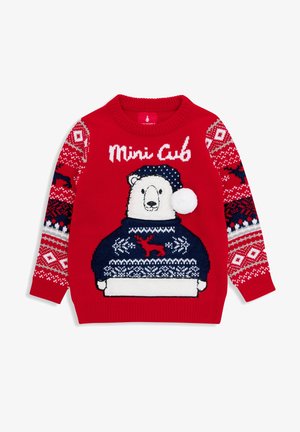 Jersey rojo para niños con el texto "Mini Cub", con un oso blanco que lleva un jersey azul y un gorro con pompón, y mangas con patrones de renos.