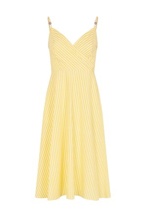 Robe sans manches à rayures jaunes et blanches avec des bretelles spaghetti et un corsage ajusté en V s'évasant en une jupe trapèze.