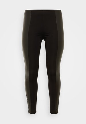 Sorte leggings med høy livhøyde, med en glanset tekstur på sidene, glatt stoff og en tettsittende design. Ingen synlige mønstre eller aksenter.