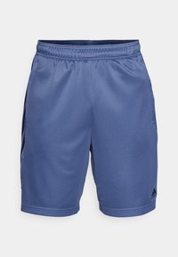 Modré sportovní šortky vyrobené z hladké, lehké tkaniny s elastickým pasem a černými bočními detaily. Na spodním lemu se nachází logo Adidas.