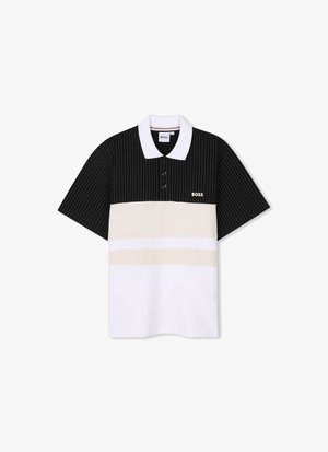 Kortekoe polo met een zwart gestreepte bovenkant, beige middenstuk en witte onderkant. Voorzien van een zachte kraag en een drieknops sluiting.