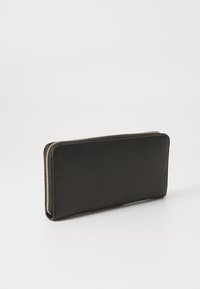 Black leather wallet with a smooth texture, rectangular shape, and gold zipper accent on the edge, designed for secure storage.