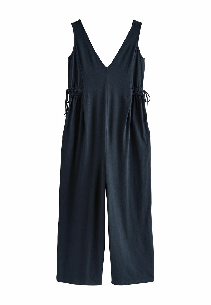Marineblåt jumpsuit med V-udskæring, ærmeløs design, elastisk snøre i livet og bredbenet skæring med en glat tekstur.