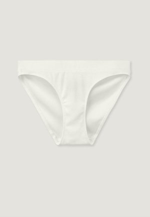 Weiße Baumwoll-Bikinihose mit glatter Textur, breitem elastischen Bündchen und minimaler Abdeckung. Mit gerippten Details.