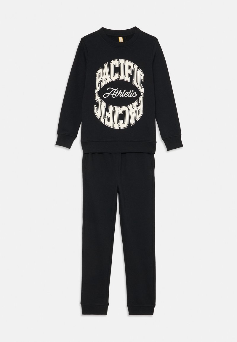 Black cotton sweatshirt and pants set featuring a circular "PACIFIC Athletic" graphic in cream. Ribbed cuffs and waistband for comfort.