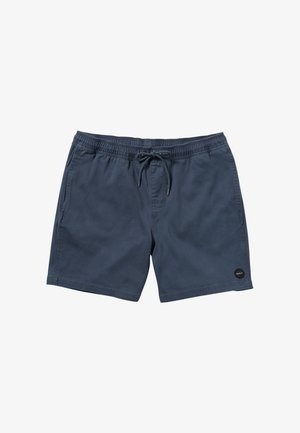 Dark blue swim shorts made of lightweight fabric, featuring an elastic waistband with a drawstring, and a circular logo patch on the hem.