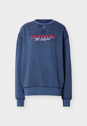 Navy blue crewneck sweatshirt with red and white "Tommy Los Angeles" embroidered text on front, ribbed cuffs and hem.