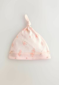 Bonnet pour bébé en coton rose doux avec un nœud sur le dessus, orné d'un motif floral en orange clair et vert. Comprend un ourlet replié.