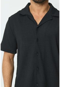 FRILIVIN ENSEMBLE UNI SET - Pantalon classique - noir