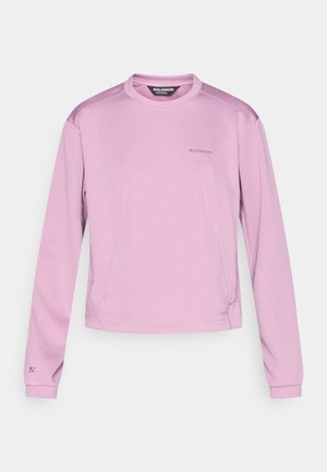 Hosszú ujjú sportpóló könnyű, lélegző anyagból, világos rózsaszínben, finom hatszögmintával és testhez simuló szabással.