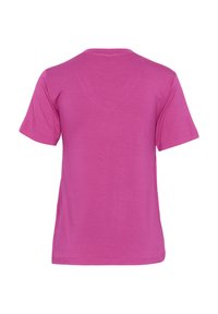 T-shirt à manches courtes en rose uni, présentant un col rond classique et un tissu doux, léger avec une texture lisse.