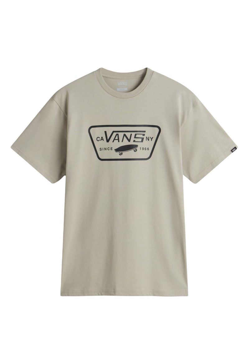 Camiseta de algodón beige de manga corta, con un logo gráfico negro en el frente que incluye una patineta y el texto: "CA VANS NY DESDE 1966."