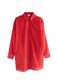 Camicia rossa abbottonata con colletto, maniche lunghe e una vestibilità leggermente ampia. Realizzata in un tessuto morbido e leggero con una sottile trama.