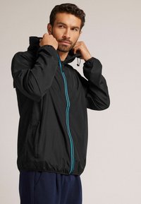 IUMAN Intimissimi Uomo Lichte jas - black