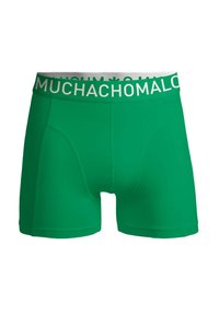 Žalios trumpikės su balta elastine juostele "MUCHACHO". Pagamintos iš lygaus, tampraus audinio, turi prigludusią išvaizdą ir neturi raštų.
