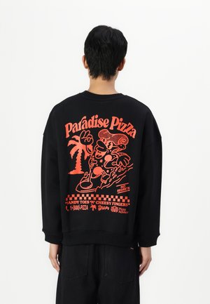 Black sweatshirt featuring a vibrant red graphic on the back with "Paradise Pizza" text, cartoon characters, and palm tree design.