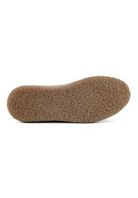 Rubber shoe sole with a textured, fuzzy brown exterior. Rounded shape with a slightly raised edge and a smooth finish.