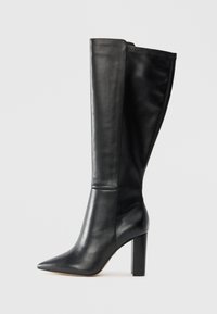 Black leather knee-high boots with a pointed toe and a chunky heel. Smooth texture, minimal seams, and sleek silhouette.