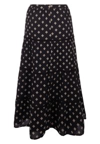 Jupe noire à volants avec un motif géométrique blanc. Dotée d'une taille à cordon de serrage et d'accents en dentelle à chaque niveau. Le tissu a une texture douce.