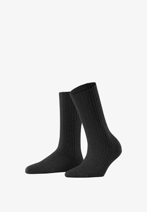 Schwarze gerippte Socken aus einem weichen Stoff, mit einer glatten Textur, hohem Design und verstärktem Zehen- sowie Fersenbereich für Langlebigkeit.