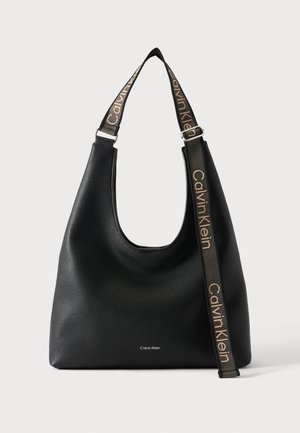 Calvin Klein, WEBBING STRAP LARGE SHOULDER - Bolso de mano - black