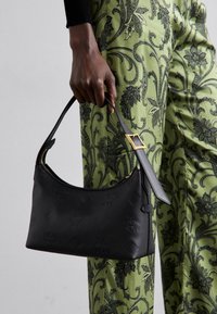 Bolso de mano - black