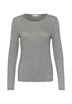 Long-sleeve top in black and white stripes, featuring a round neckline and a fitted silhouette, made from a soft, stretchy fabric.