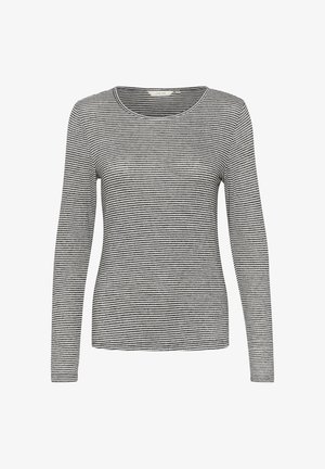 Long-sleeve top in black and white stripes, featuring a round neckline and a fitted silhouette, made from a soft, stretchy fabric.