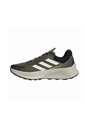 Dunkelgrüner Laufschuh mit weißen Streifen, beiger Sohle, schwarzer Ferse und Schnürverschluss, von der linken Seite dargestellt.