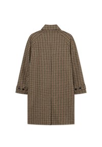 Brun rutigt kappa med krage, långa ärmar och knäppta manschetter. Har en strukturerad design och är i midjehöjd.