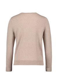 Pullover beige in morbido tessuto a maglia. Presenta un collo rotondo, maniche lunghe e polsini e orlo a coste. Nessun motivo o accento decorativo.