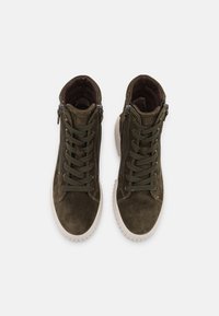 High-top sneakers in dark olive suede with lace-up front, zip closure, and textured white rubber sole. Features padded interior for comfort.