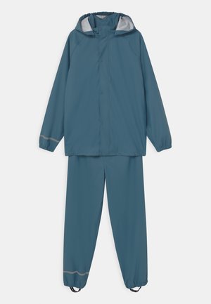 NKNDRY RAIN SET UNISEX - Spodnie przeciwdeszczowe - real teal