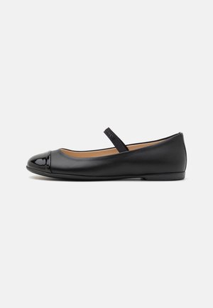 Black leather ballet flat with a patent leather cap toe and a thin straps on the upper. Smooth texture and simple design, suitable for casual wear.