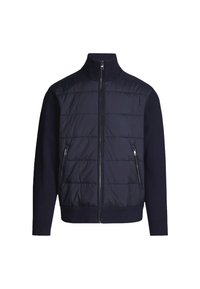 Chaqueta de navy con cierre delantero, torso acolchado y mangas de punto. Cuenta con dos bolsillos con cremallera y un cuello alto. Textura suave.