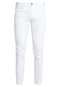 Jean skinny blancs en denim, avec cinq poches, un fermeture bouton à l'avant, et une texture lisse sans motifs visibles.