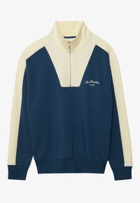 Maglione a pullover blu navy e crema con colletto a half-zip, caratterizzato da un design a forma di V e testo del logo sul petto. Materiale in morbido misto cotone.