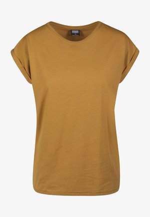 Gorčično rumena kratka majica s kratkimi rokavi in krožnim izrezom, narejena iz mehkega bombažnega materiala, s šalčkasto obrobo in sproščenim krojem.